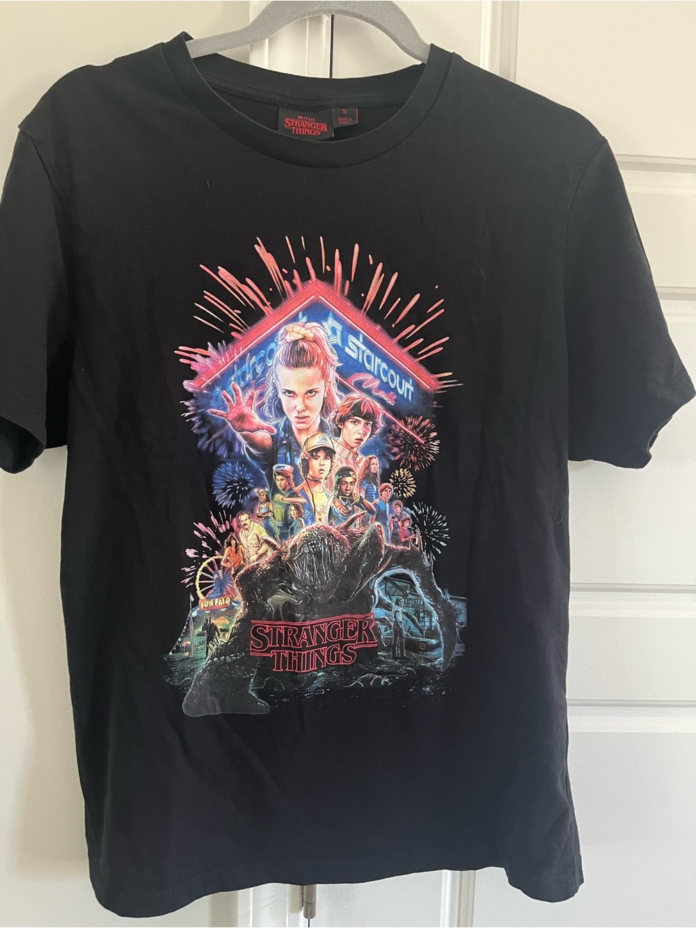 Netflix Stranger Things Black Tee with Neon Multi-Color Poster Art